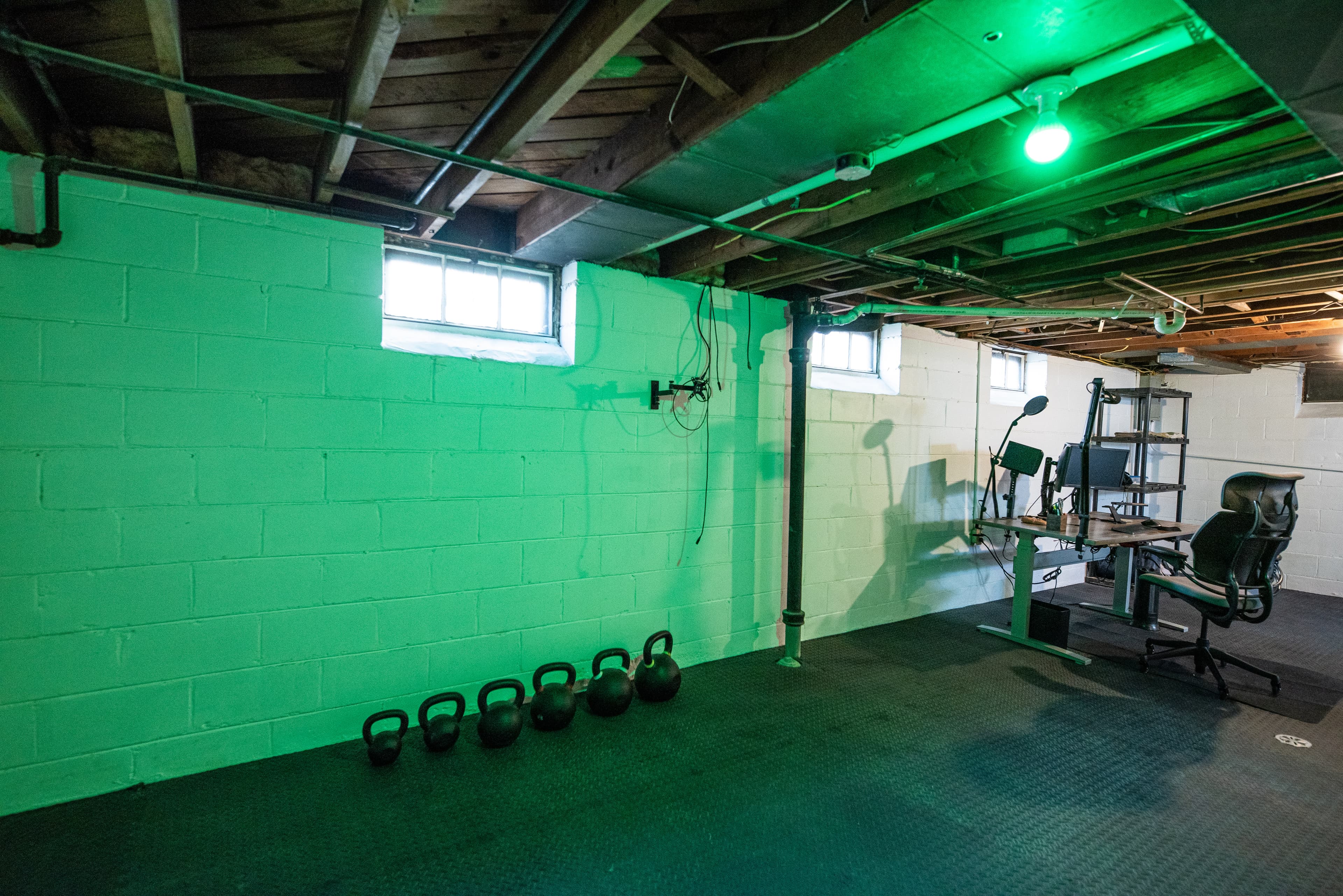 Basement Gym with Green Lighting